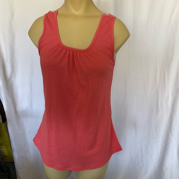 Filly Flair sleeve top. It has a very delicate detailed back in a coral color. - Picture 1 of 8